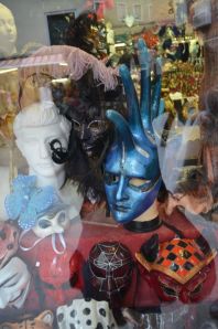 Venice- I only bought 2 masks.  Mostly because I could not figure out a way to get a gold lace unicorn head home without breaking off the horn.    :(